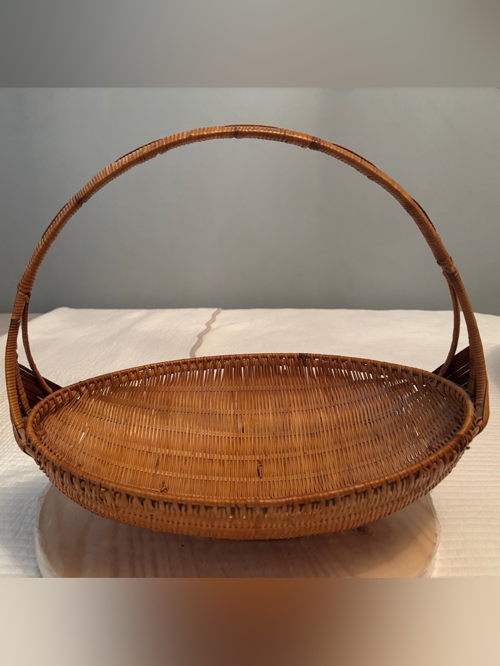 Vintage oval-shaped gathering basket,
